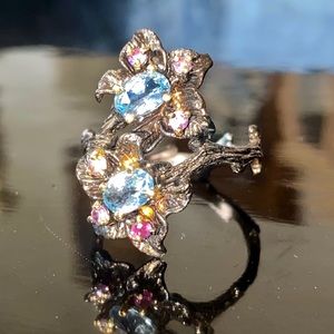 Genuine Blue Topaz and Amethyst Ring